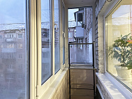 Балкон ПВХ с обшивкой вагонкой